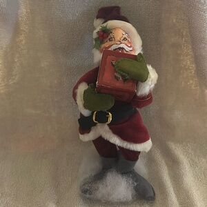 Annalee vintage 1986 Christmas Santa holding a present